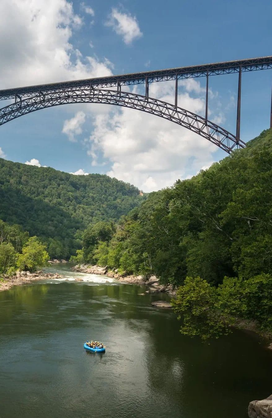 The New River Gorge Bridge over the river on a summer day